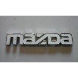 Mazda 323 IV - Emblema principal (MAZDA)