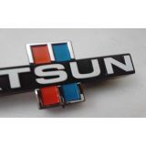 Nissan 720 Pick-up - Emblema principal
