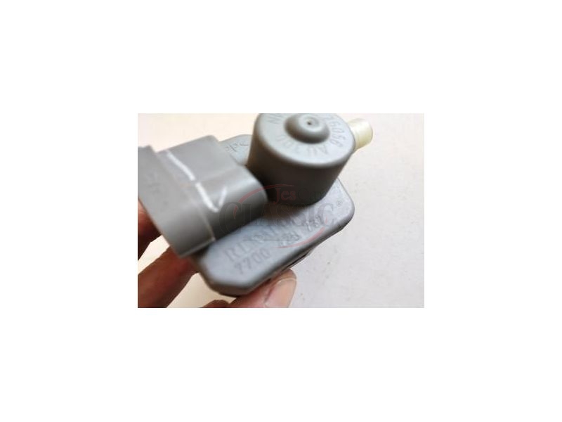 Nissan D40 - Afinador corrector de farol principal eléctrico (HELLA)