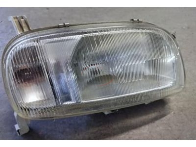 Nissan Micra II K11 - Farol princinpal direito H4 (NISSAN)