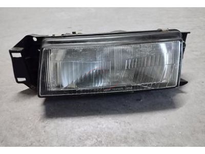 Mazda 323 IV BG - Farol principal esquerdo H4 (KOITO)