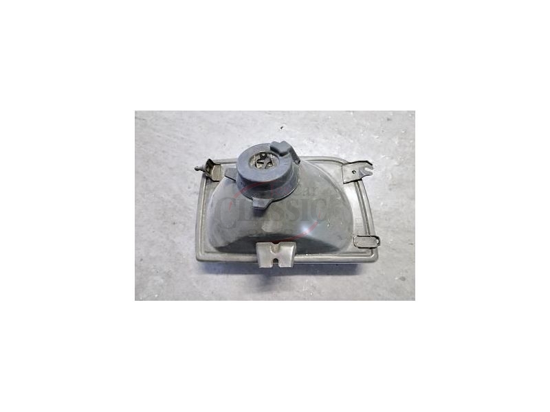 Nissan Micra I - Farol principal esquerdo H4 (NISSAN - IKI)