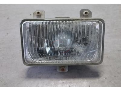 Nissan Vanete C220 - Farol principal esquerdo (HELLA)