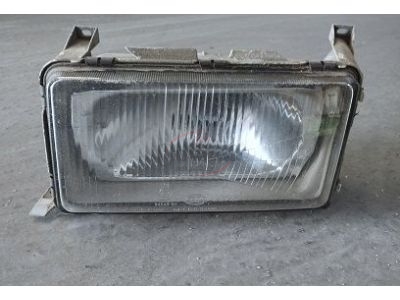 Volvo Serie 340-360 - Farol principal esquerdo H4 esquerdo (HELLA)