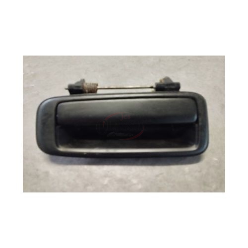 Toyota Corolla VI EE90 - Manipulo de abertura porta traseira esquerda exterior (AISIN)