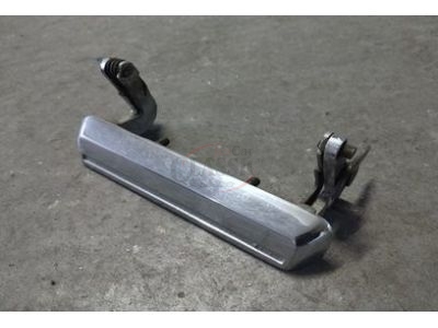 Toyota Corolla II KE20 - Manipulo de abertura porta exterior traseira esquerda