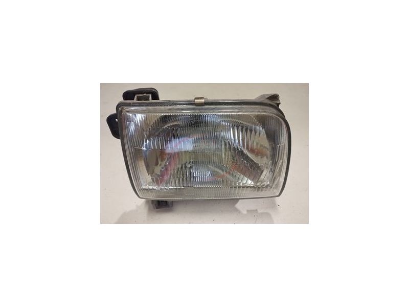 Nissan D22 - Farol principal direito H4 (NISSAN - KOITO)