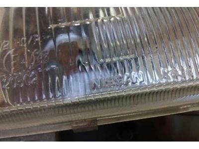 Nissan D22 - Farol principal direito H4 (NISSAN - KOITO)